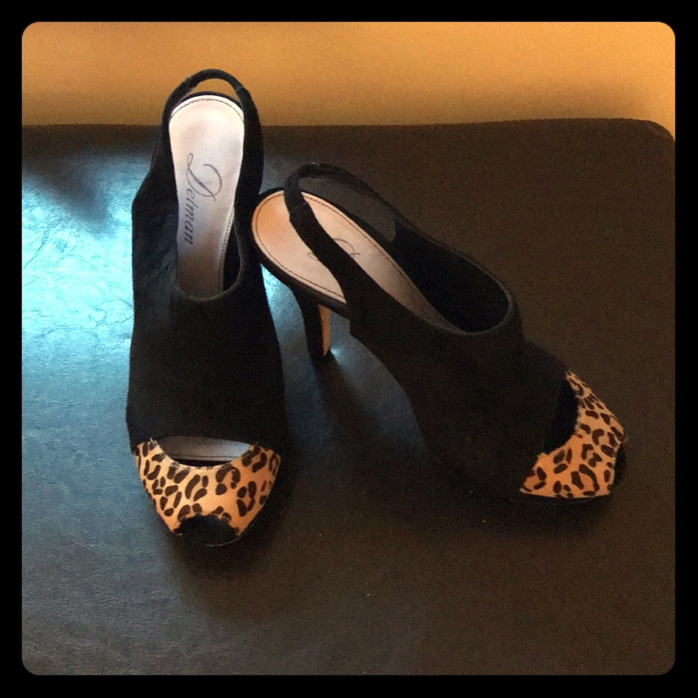 Peep toe black suede pumps